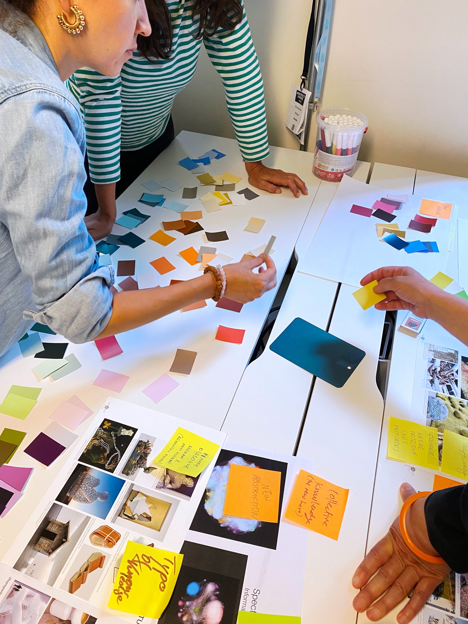 People selecting colour samples