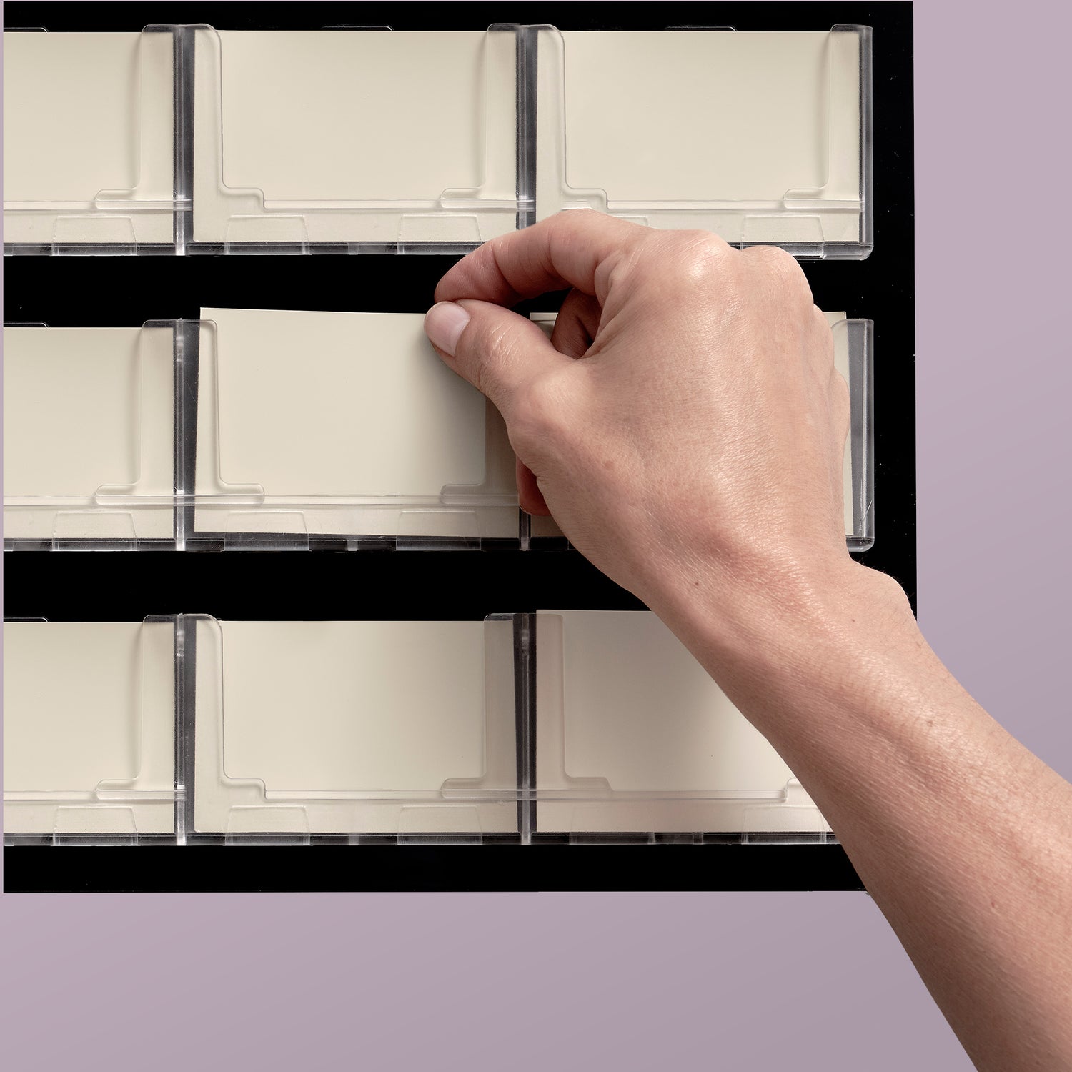 Hand holding a display sample