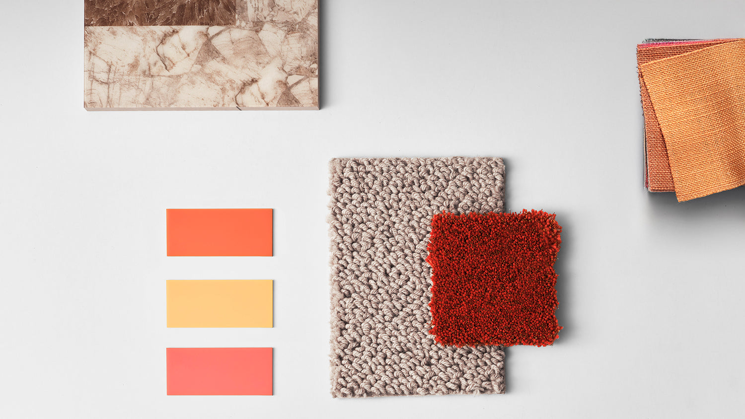 Moodboard with colour samples, stone and different fabric