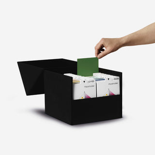 Hand displaying a colour sample from the NCS Certified Box