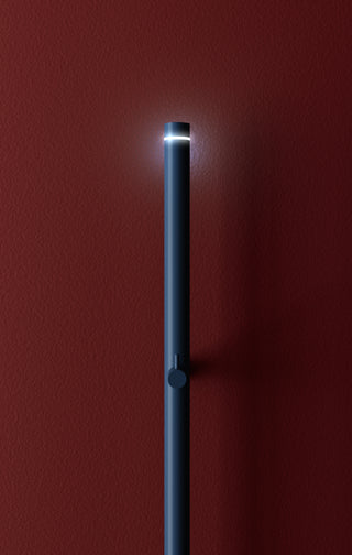 Blue towel dryer and red background